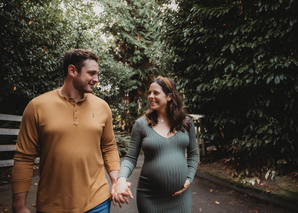 maternity mom and dad walking 