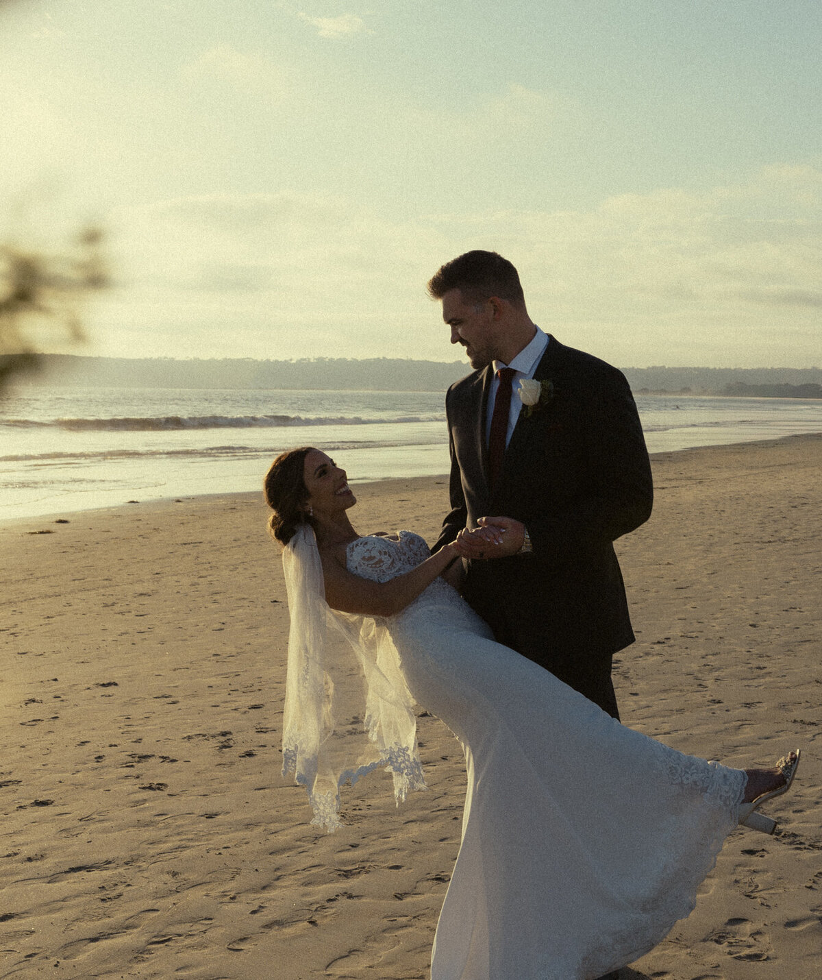 Thuy Tran Photos captured Amanda and Matt's wedding at Coronado beach in San Diego. 