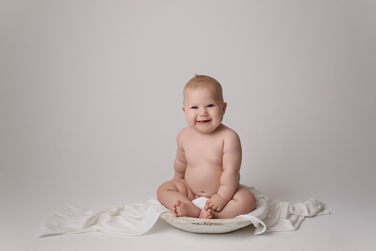 9 month old girl in bowl