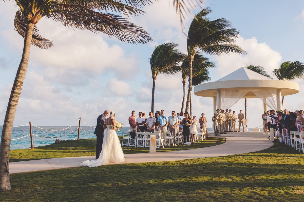 Bride walking to gazebo at Hyatt Ziva in Cancun