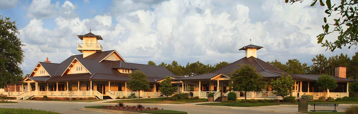 view of the Reserve clubhouse and golf shop at St. James Plantation