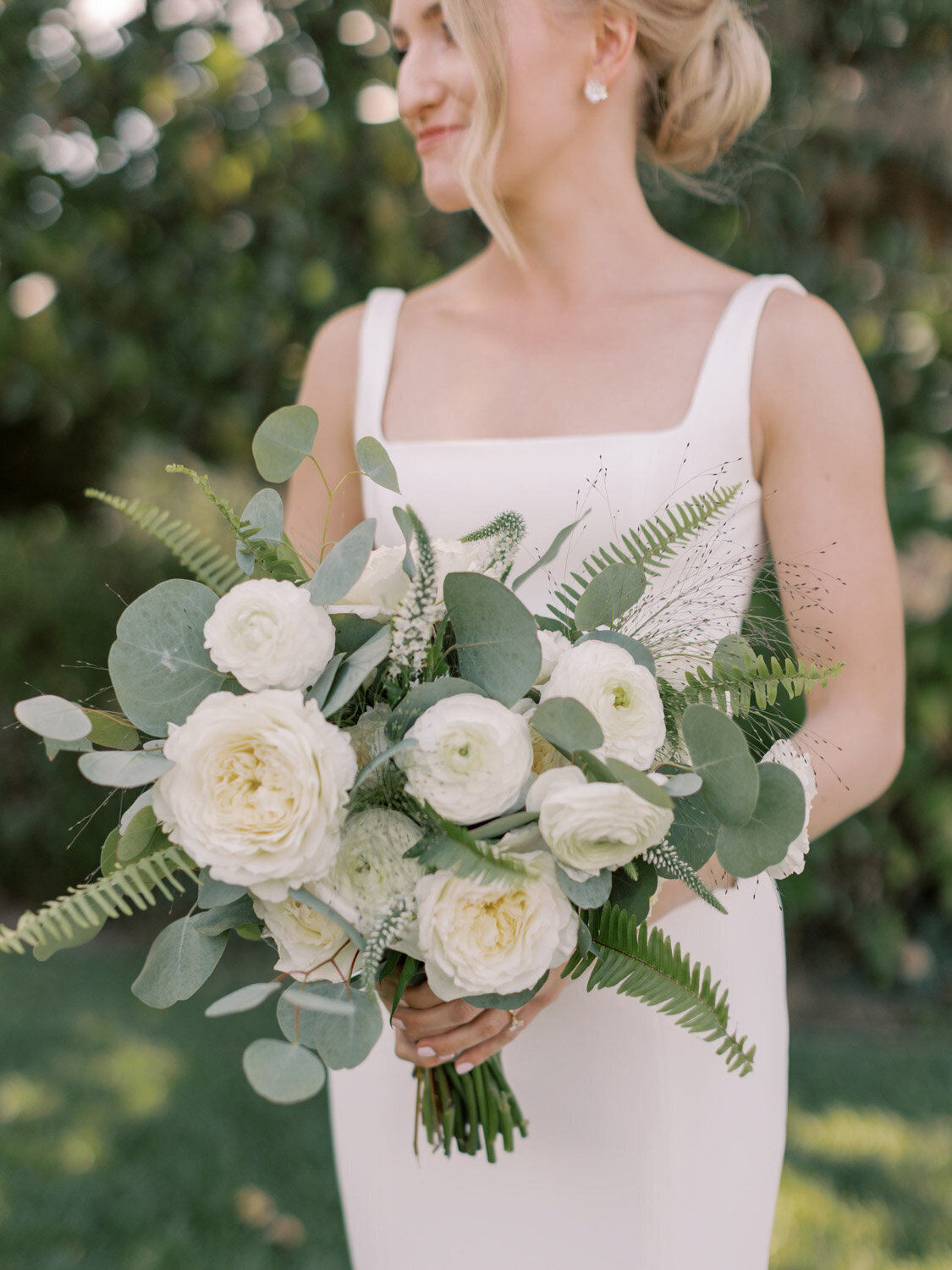 Bride holding her elegant wedding bouquet