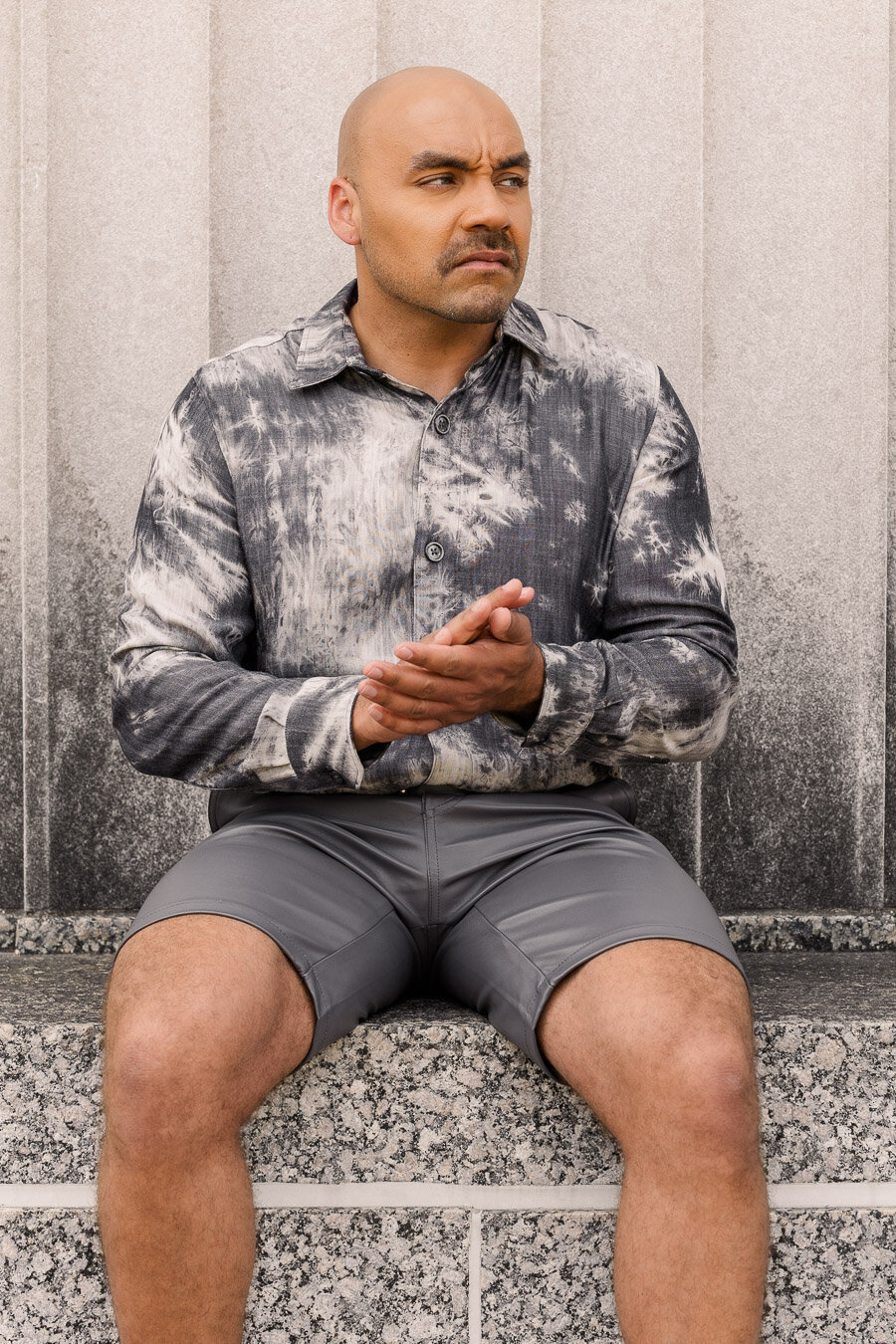 portrait-man-gray-shirt-rubbing-hands-14159