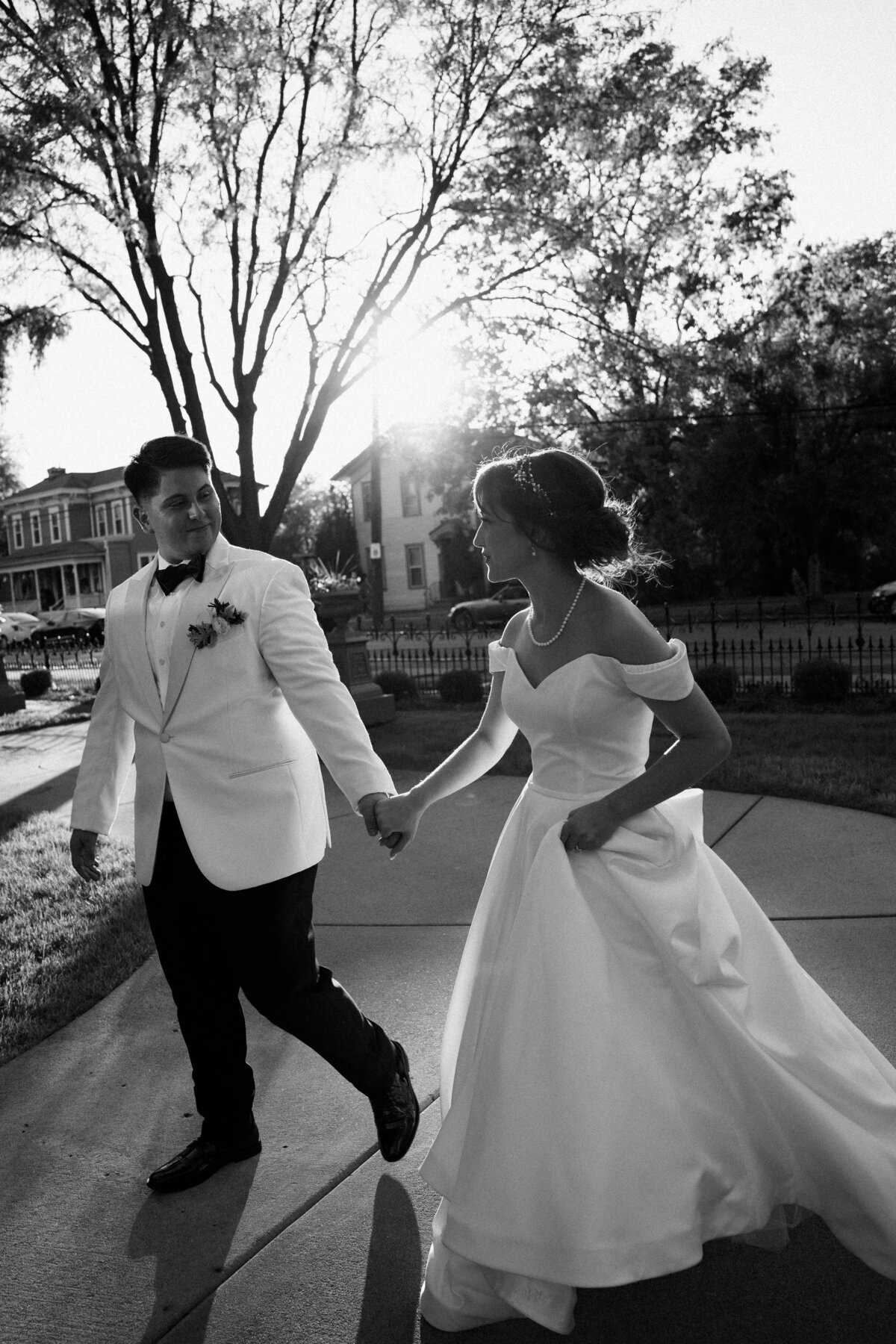 wedding couple holding hands