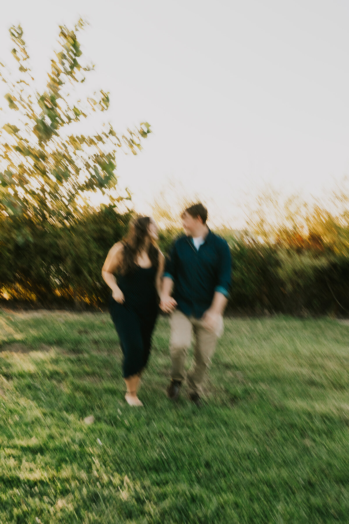 Outdoor Indiana wedding with guests, candid celebration moment.