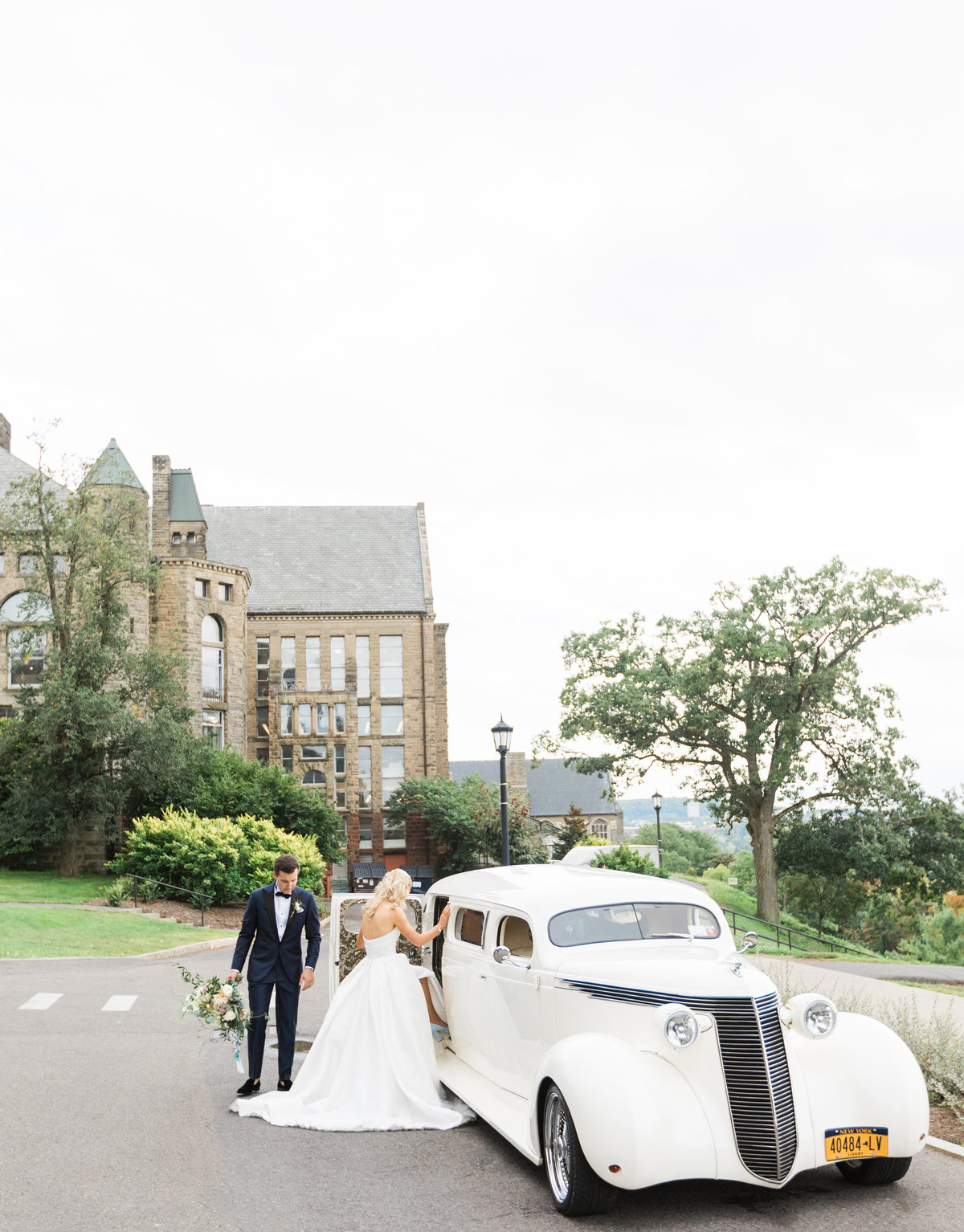 bride and groom getaway car