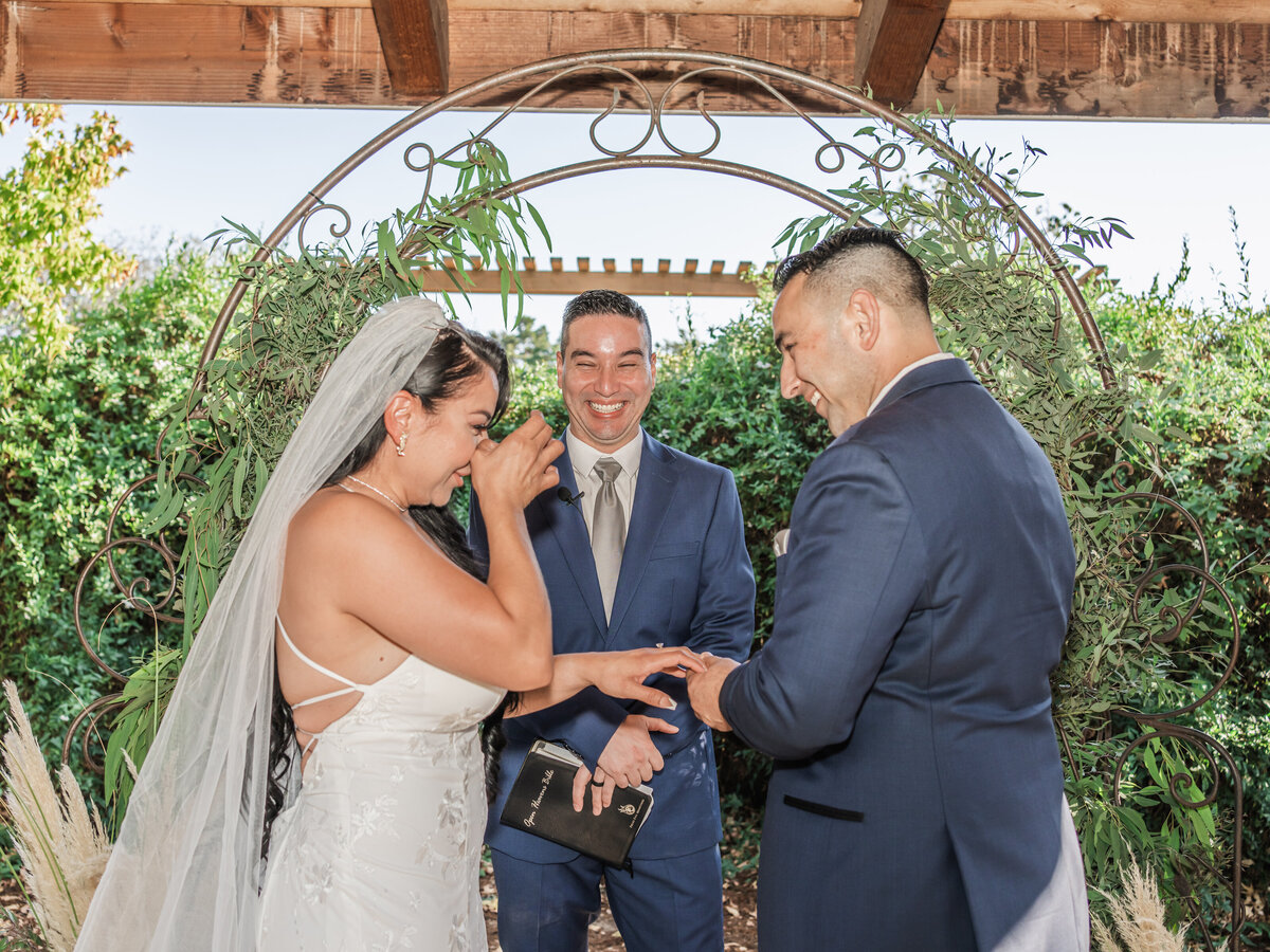 Bride cries during the ceremony. Emotional moment in private residence in Sonoma, California. Photo by 4Karma Studio