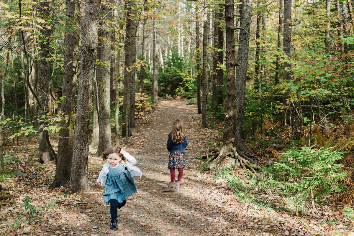 Kids running through the forest.