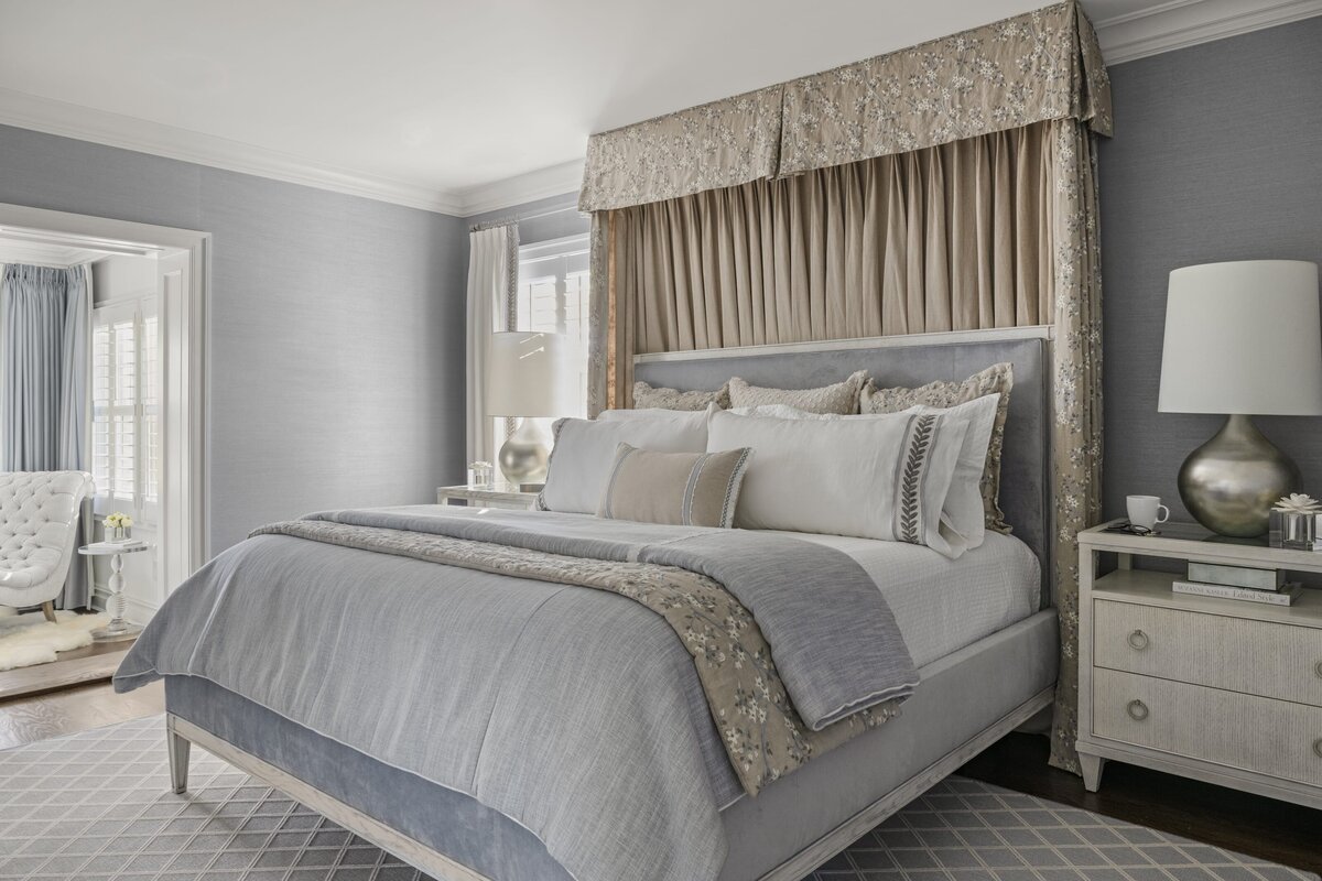 candra lynn interiors ocean port project bedroom with soft blue color and large bed