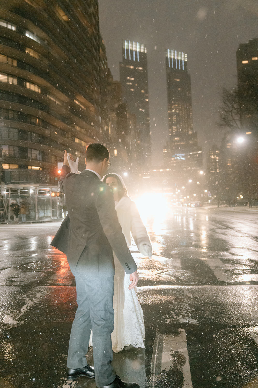 Snowy night time wedding portraits New York City wedding | Oduma photography