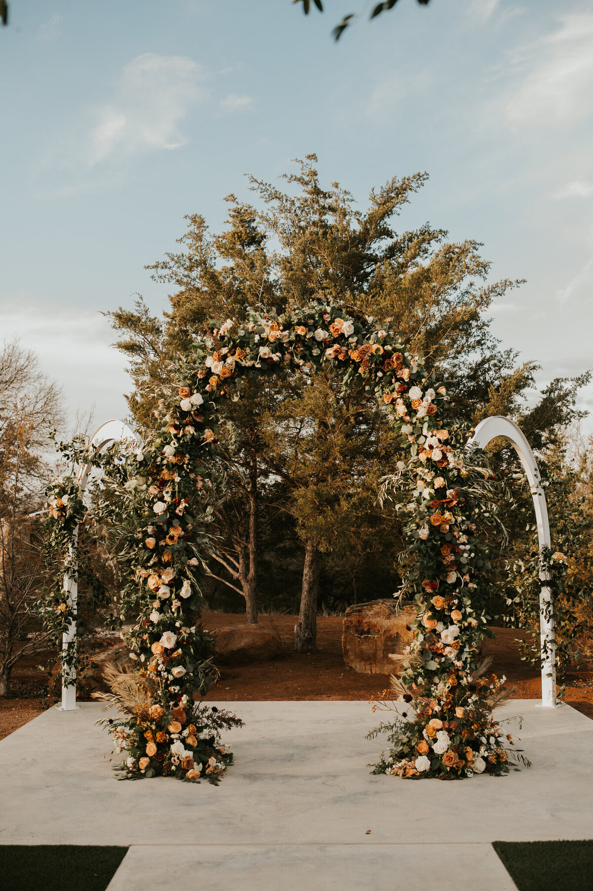 Close up view of the arches with floral arrangements