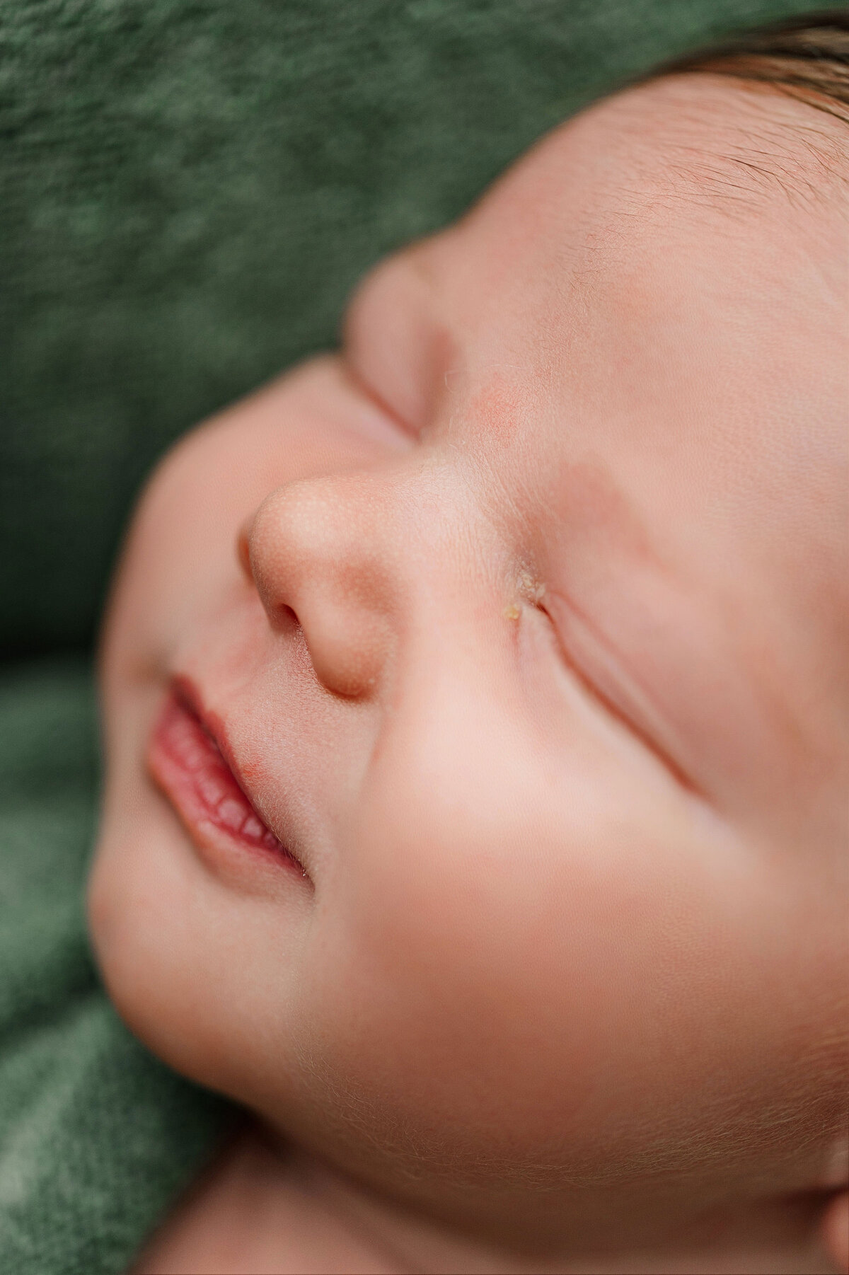 close up photo of baby eyes and smile during photo session