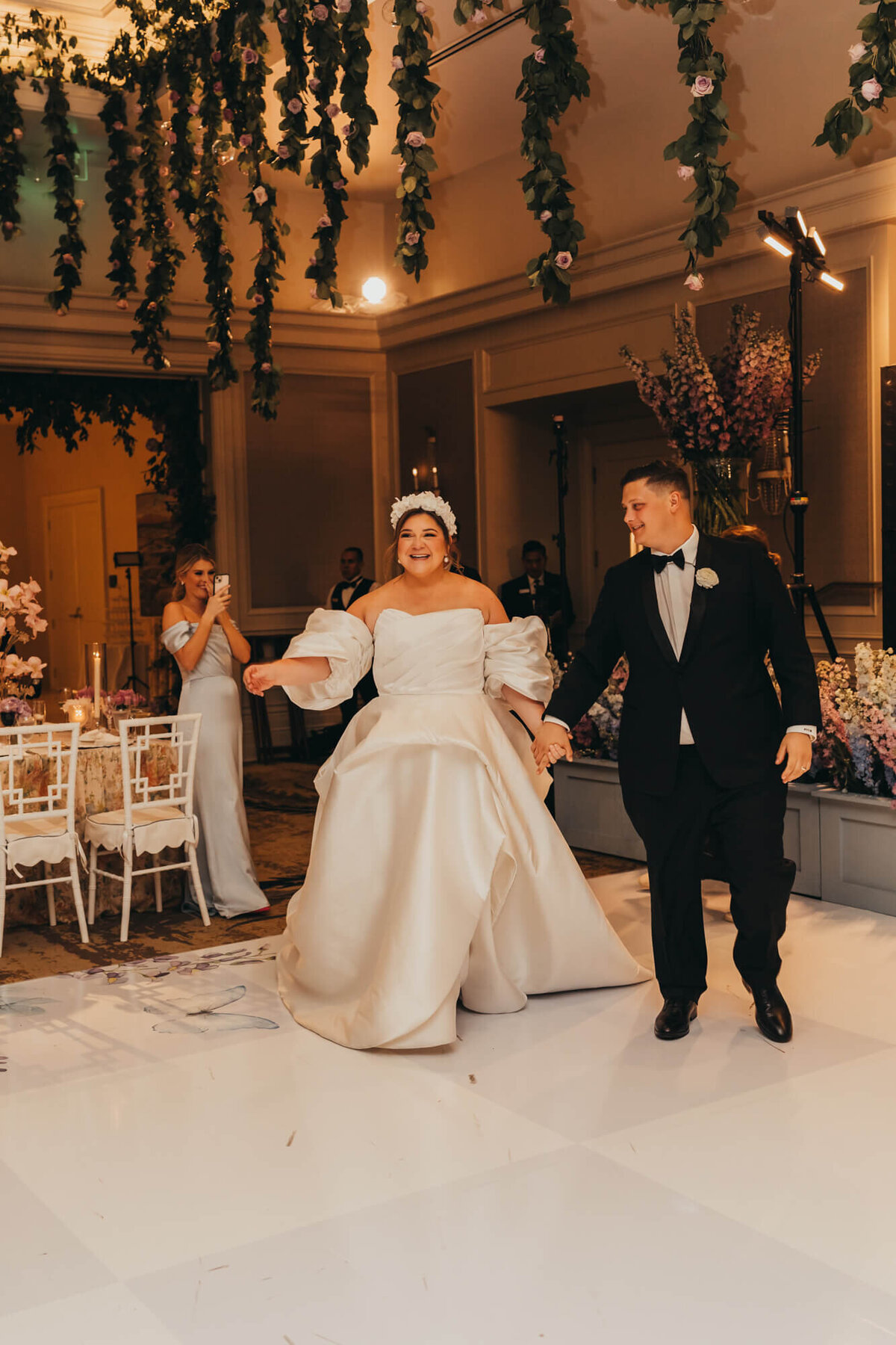 bride and grooms entrance into their reception