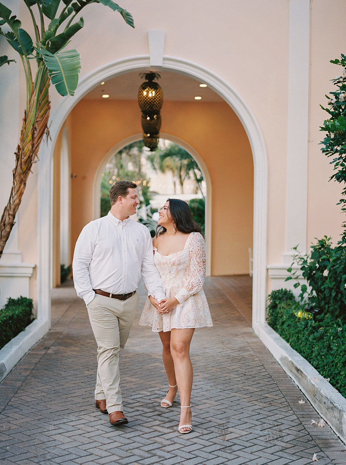 couple-walk-through-archway-2NA-E