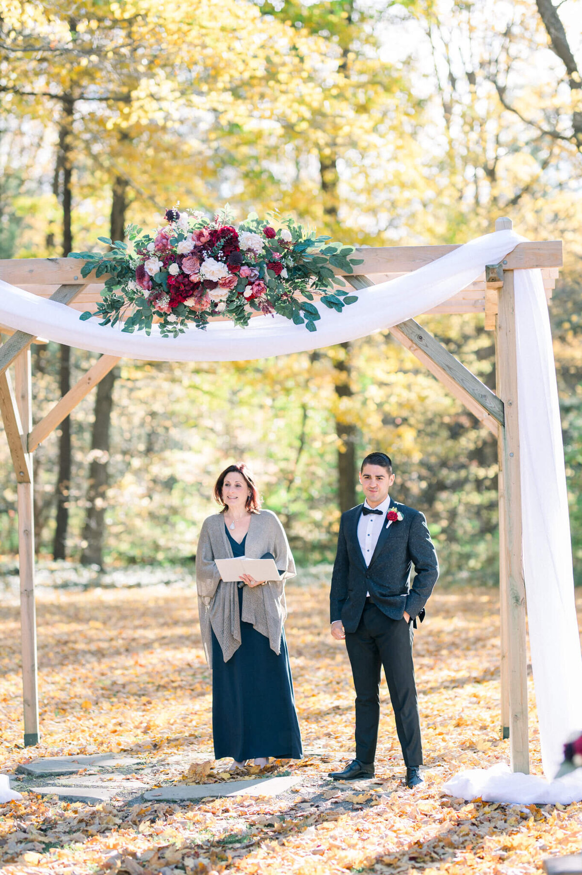 Groom at the alter under the arches at Balls Falls outdoor ceremony