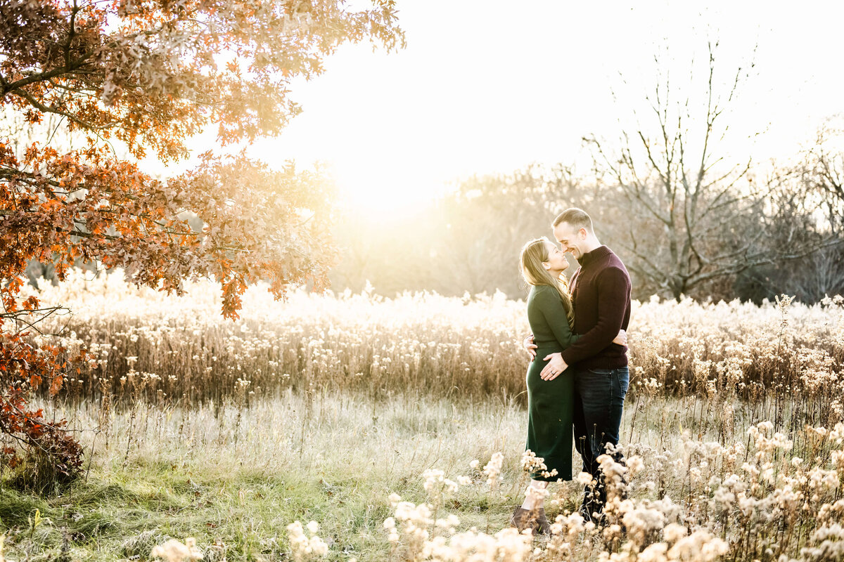 A married couple embracing during sunset near Chicago at a couples photography session.