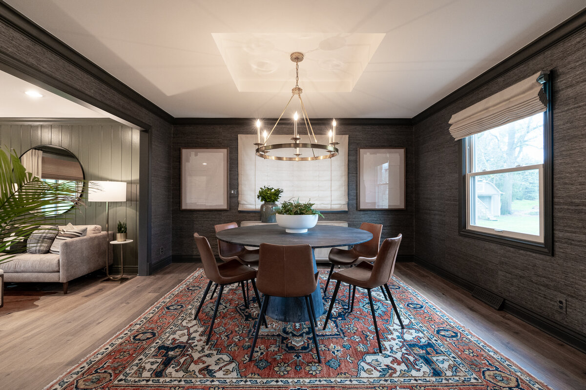 dining room with dark walls and furniture