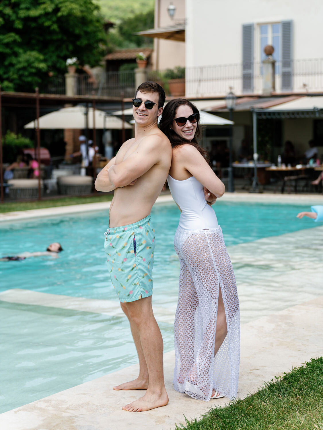 25-Bride-and-Brother-Poolside-Moment