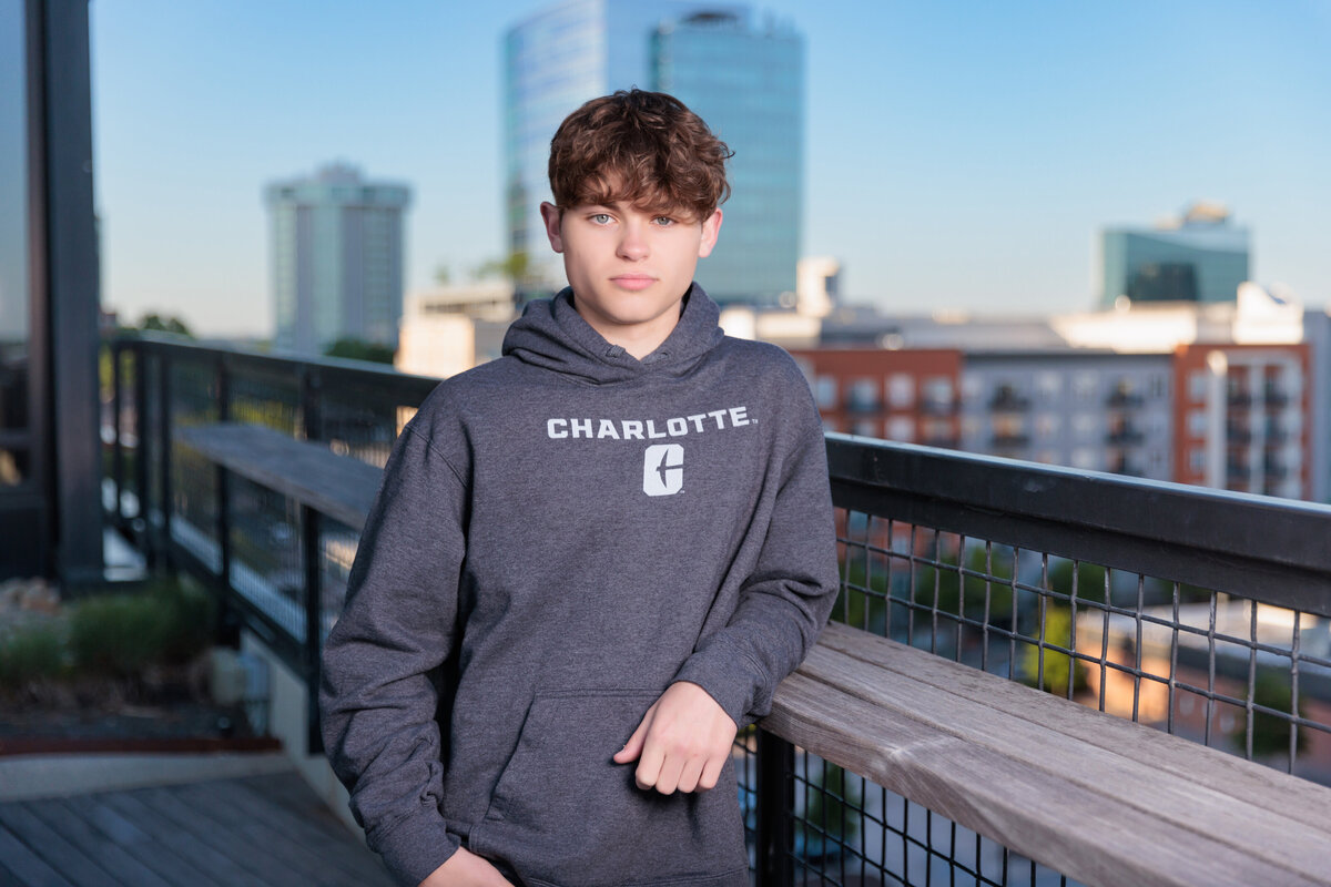 College Decision sweatshirt on a rooftop in Raleigh NC.