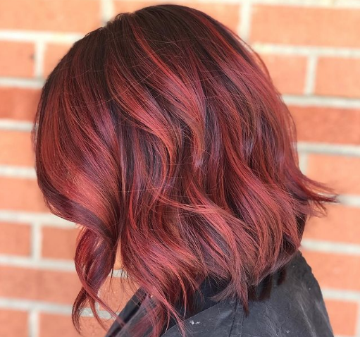 Bright red hair color and style