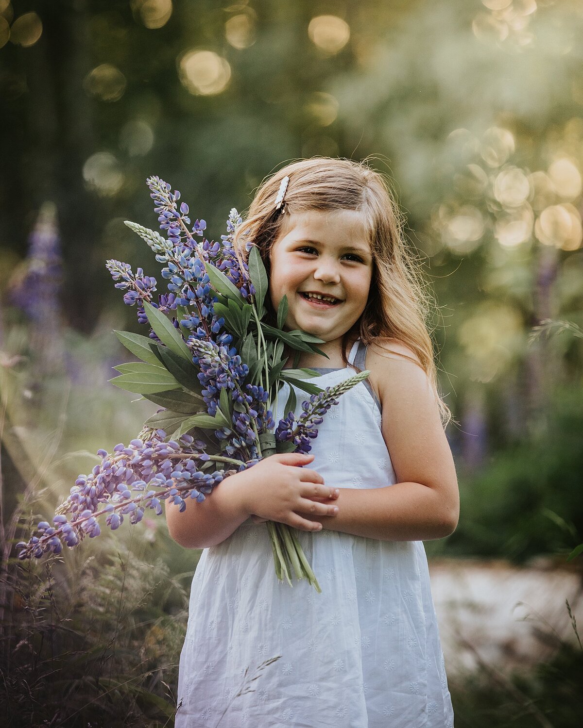 Young girl in lupins