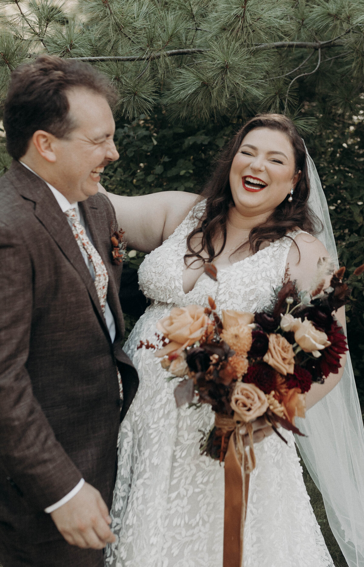 candid laugher wedding photography curvy bride