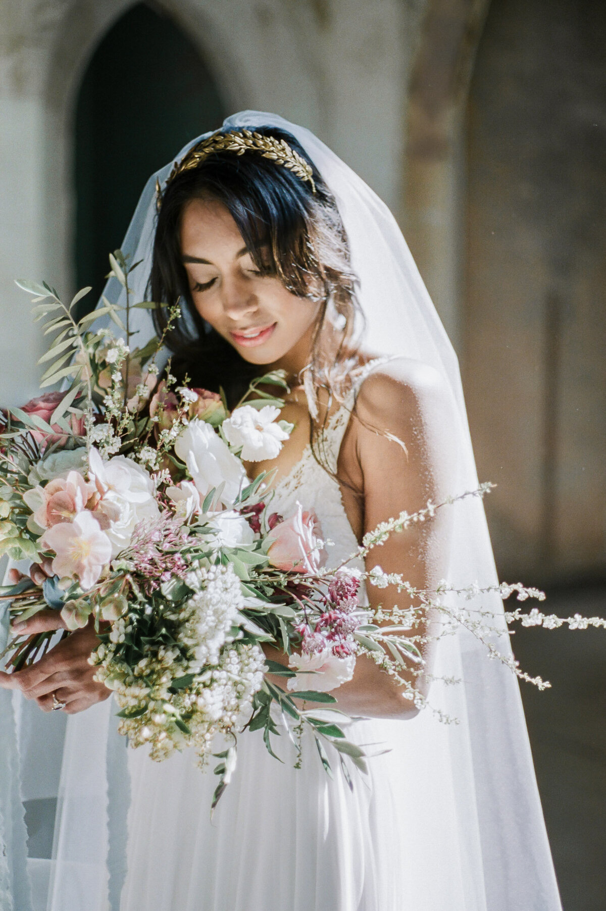 Indian bride with colorful bouquet, Italy film wedding photographer, ruins wedding