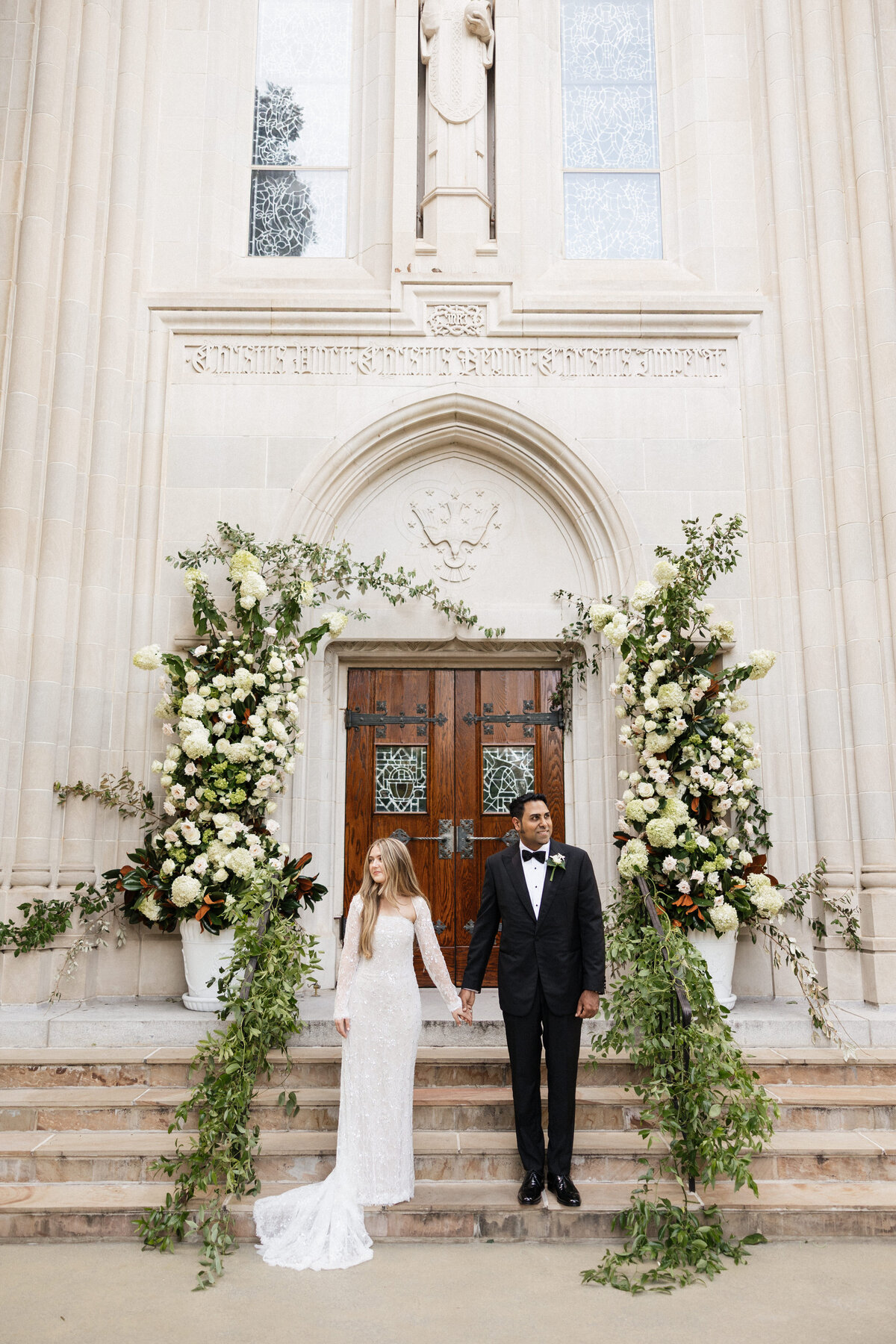 Couple outside of church after their ceremony.