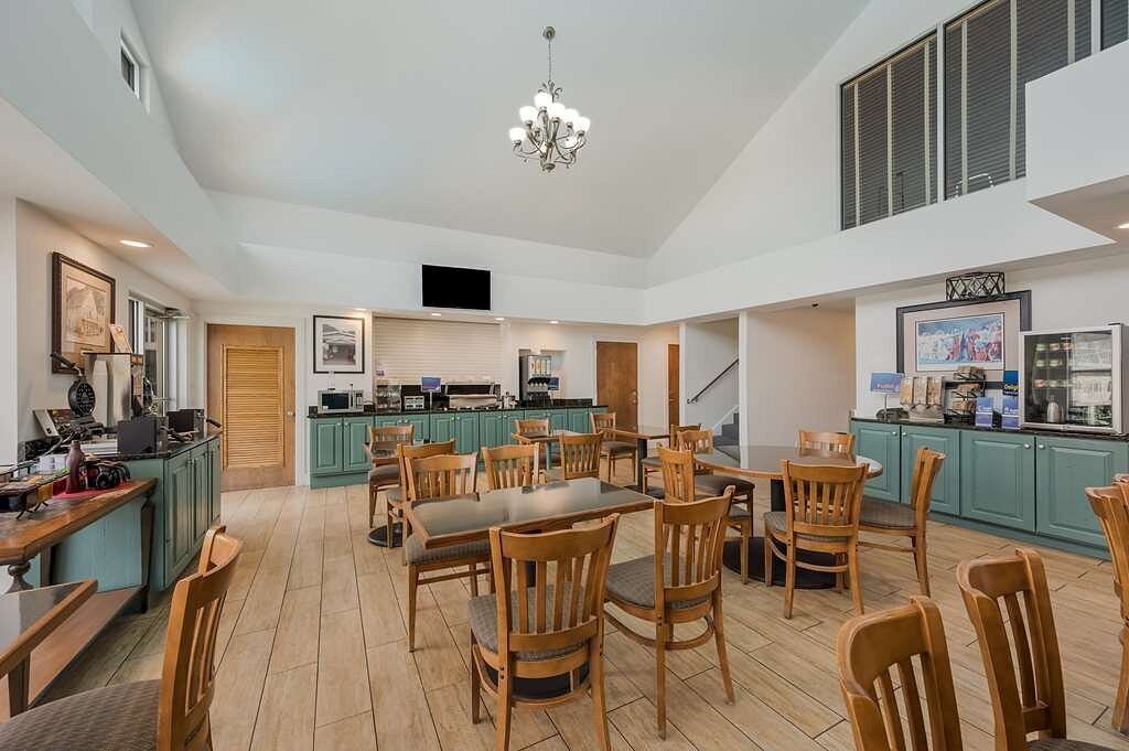 Hotel breakfast area with dining chairs