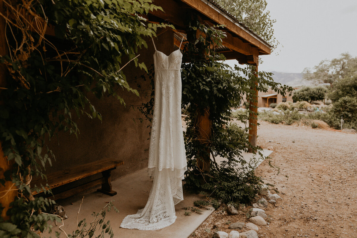 lace wedding dress hanging