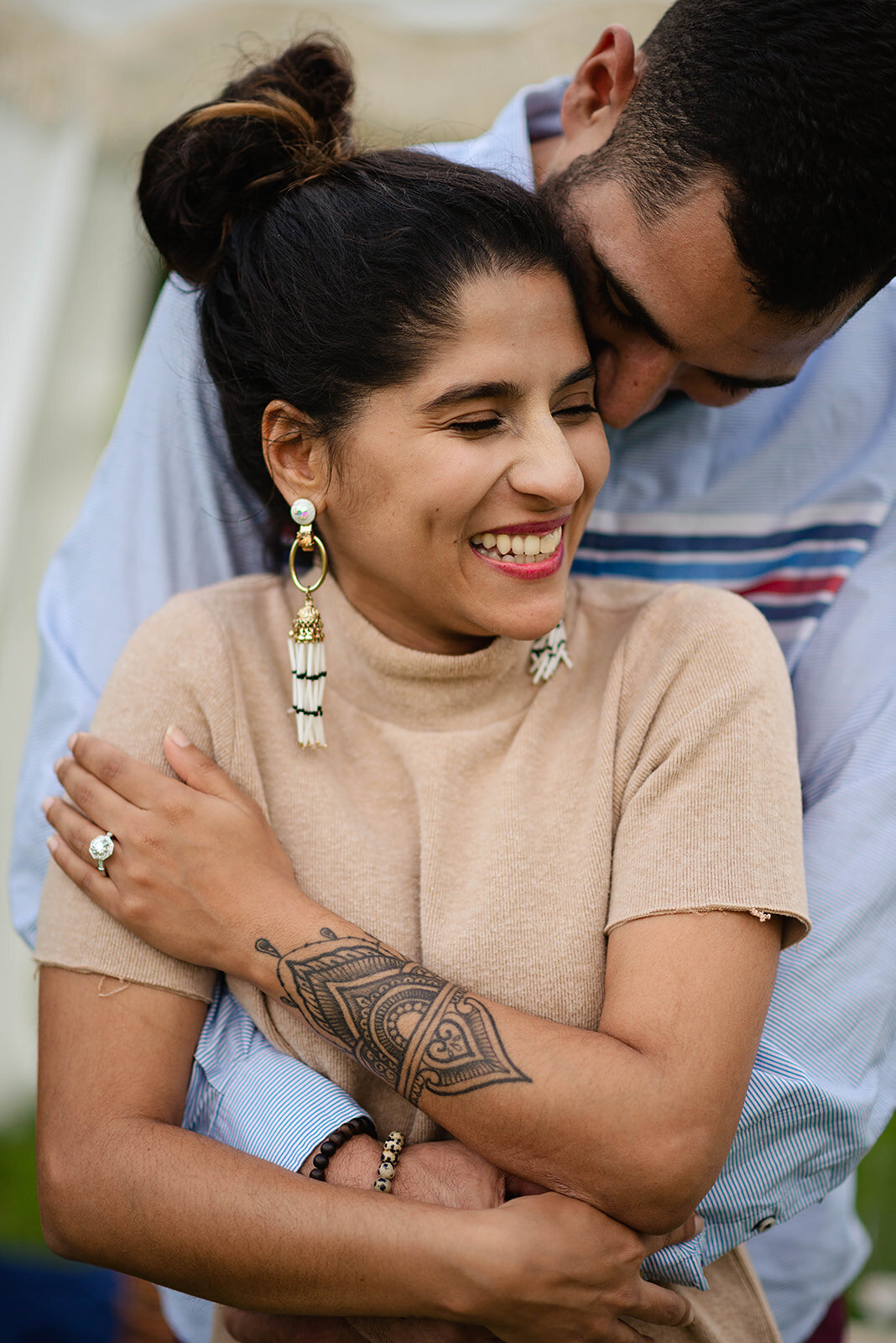 Where to propose in Austin couple embracing while woman smiles