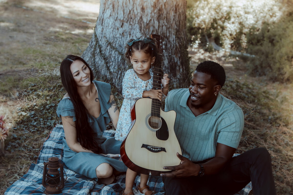 Little Girl Holding Guitar – Prospect Park Redlands Family Photography