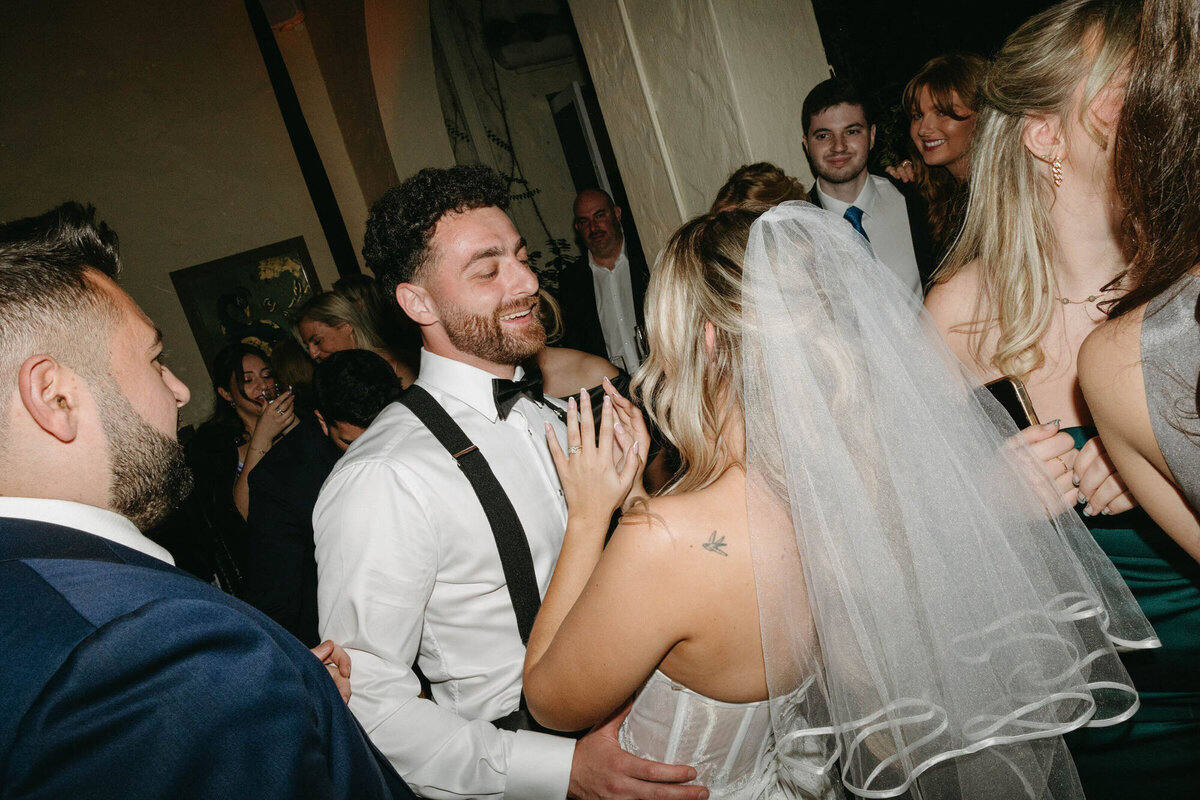 Bride and groom dancing at wedding reception, taken by Marissa Nicole, Orlando Photographer