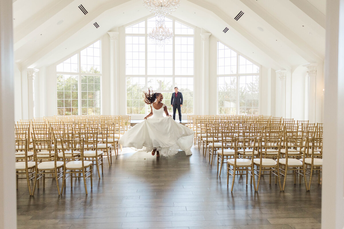 Discover the perfect wedding venue with stunning natural light and elegant decor. Capture the joy and romance of your special day, just like this radiant bride and groom in a beautifully sunlit ceremony space. Ideal for unforgettable wedding photography.