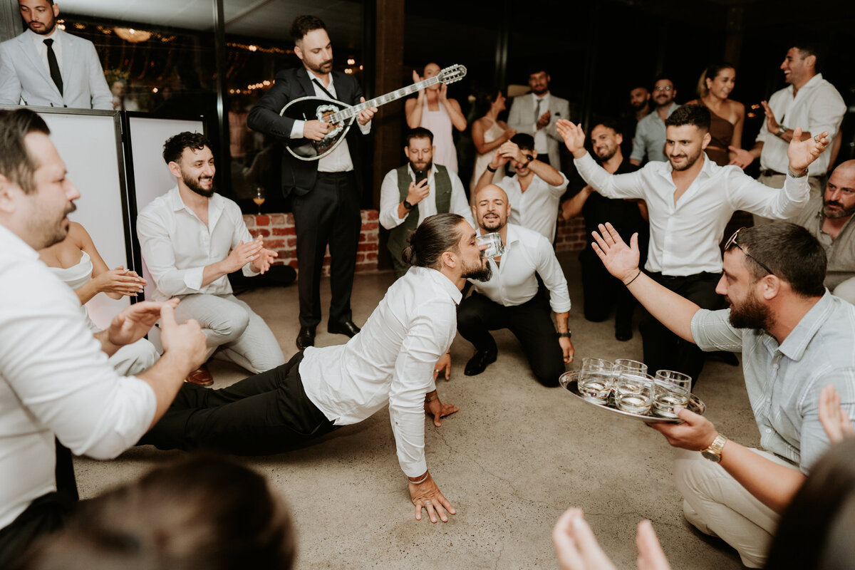 Groom dancing during reception at acacia ridge 