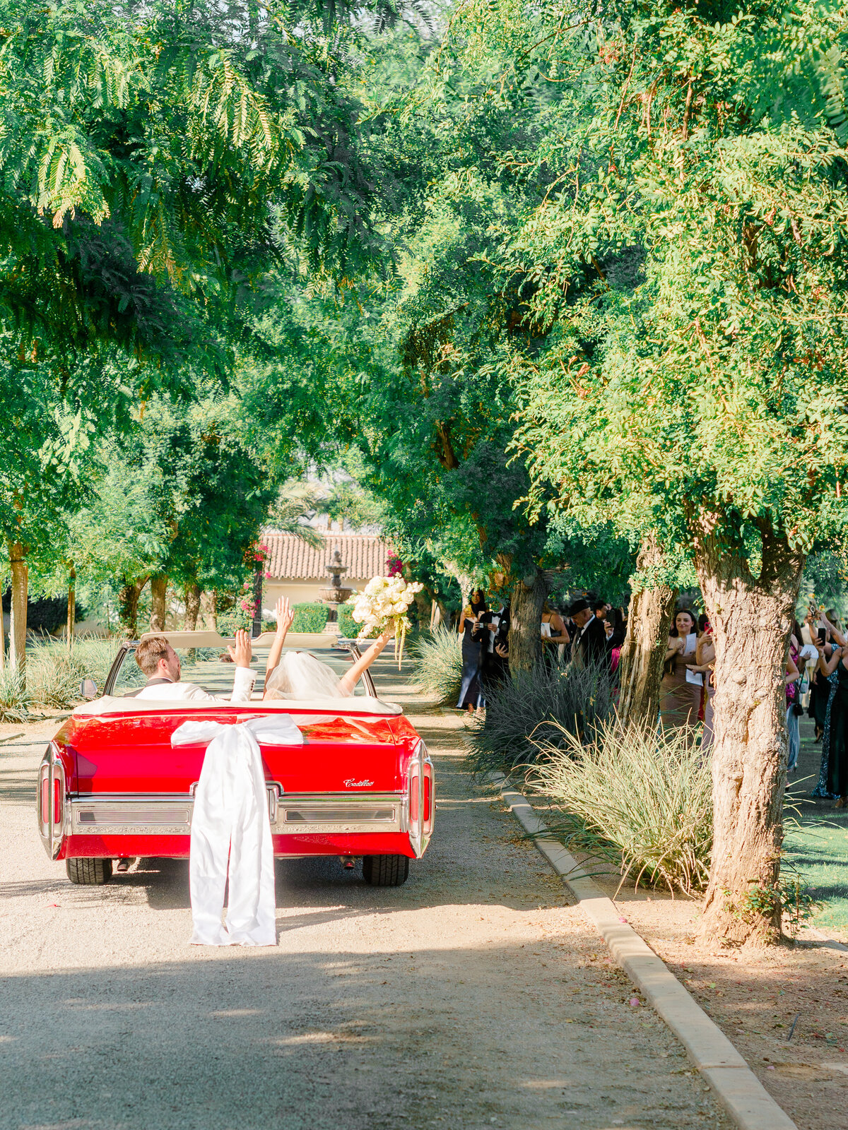 vintage-car-wedding-exit-red-cadillac-philadelphia-photographer.jpg
