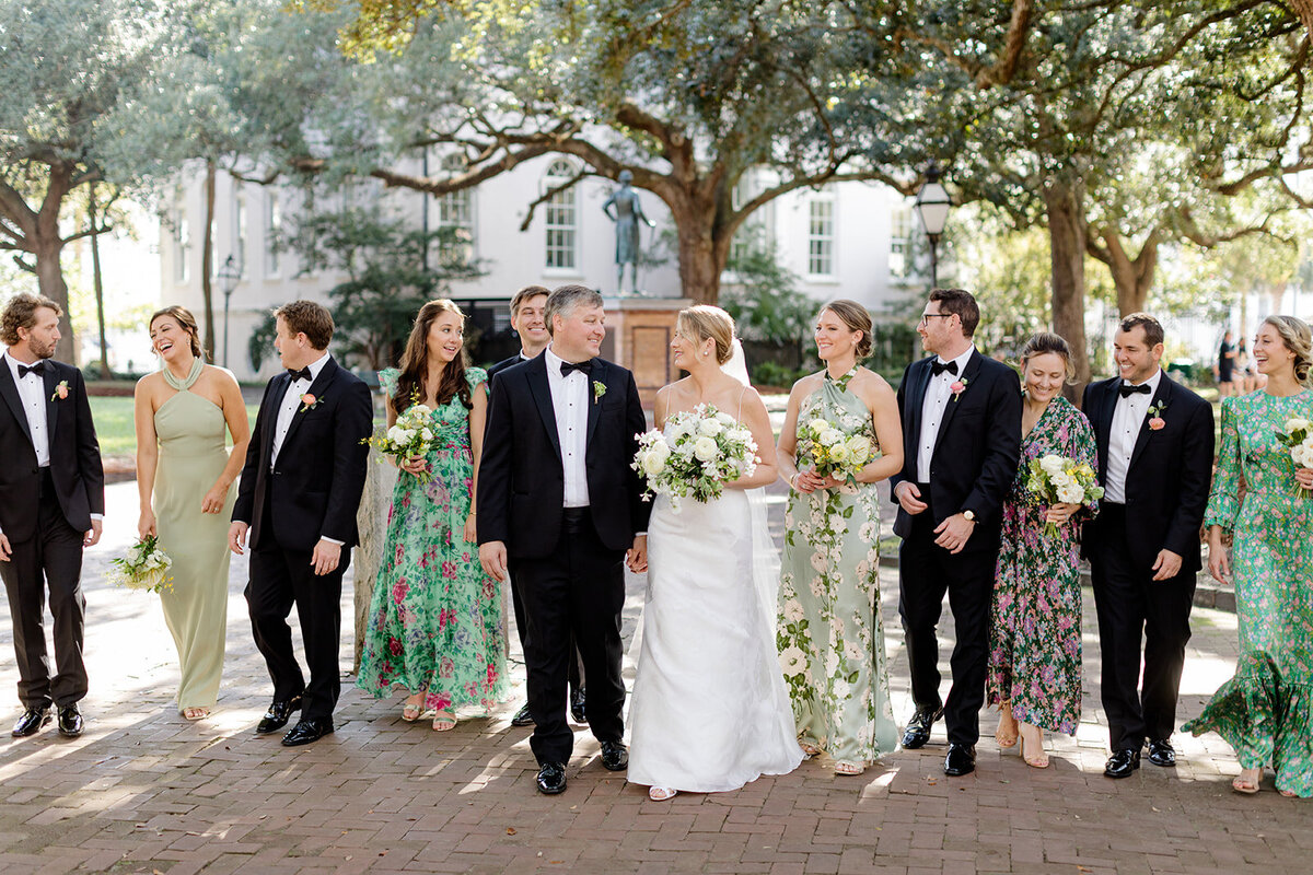 Bridal party walking in Washington Square; Charleston, South Carolina