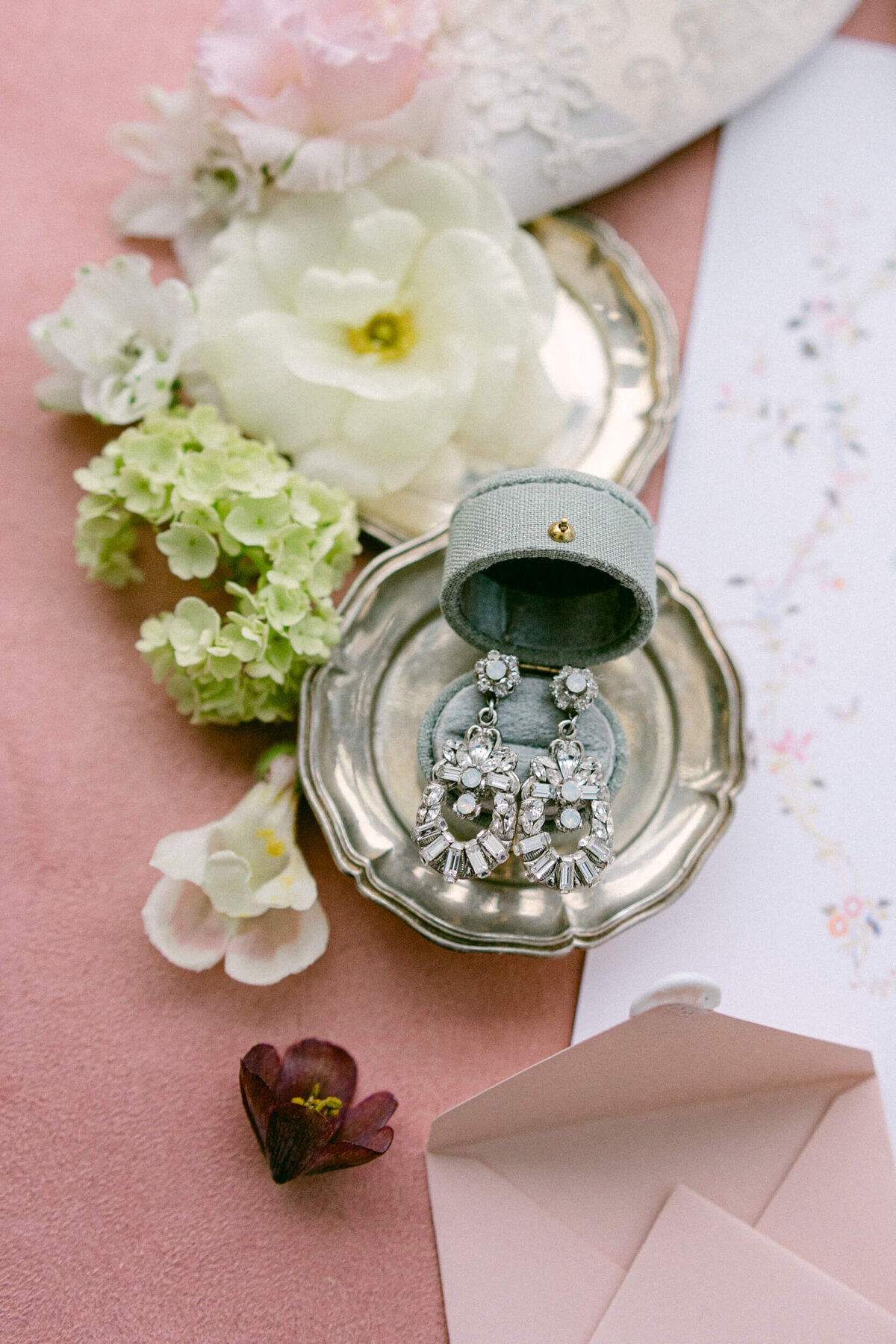 A wedding photo of the brides earrings at villa balbiano on lake como in italy