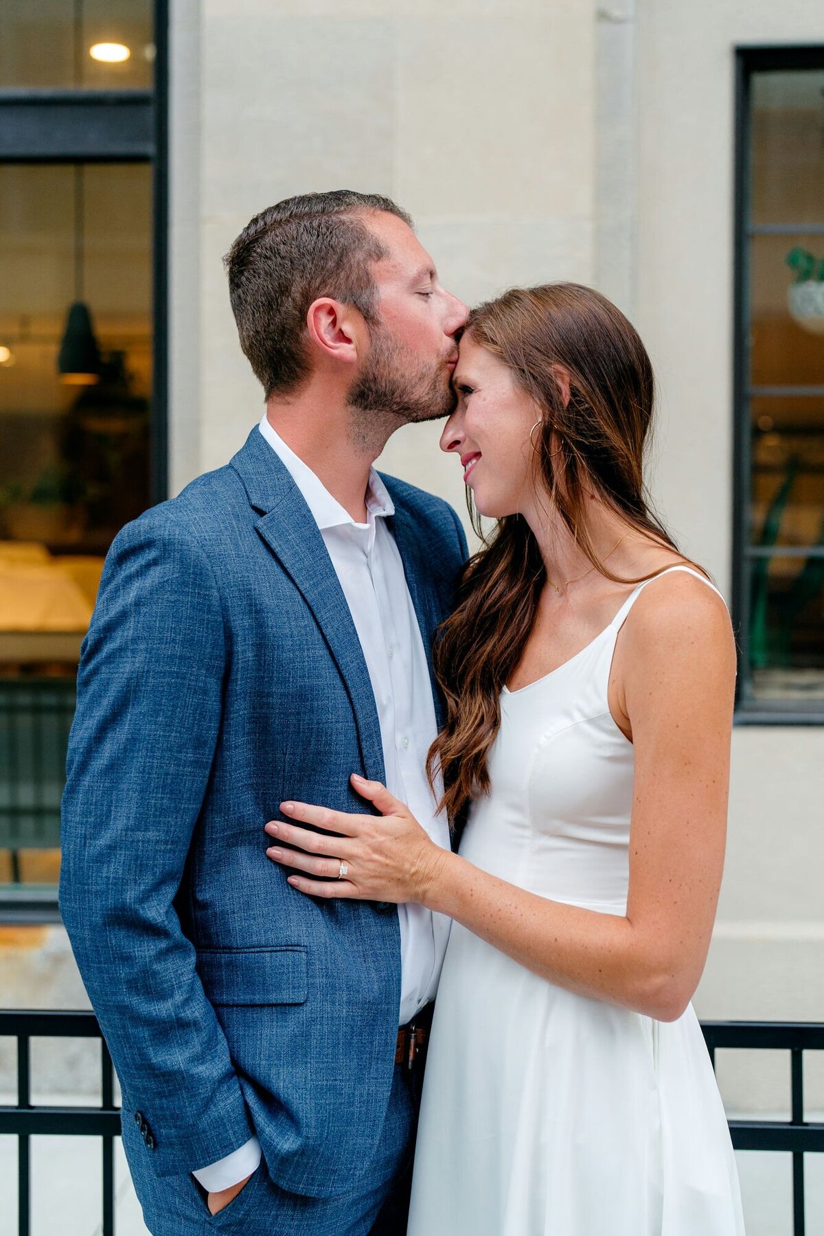 man-kissing-womans-forehead-close-up
