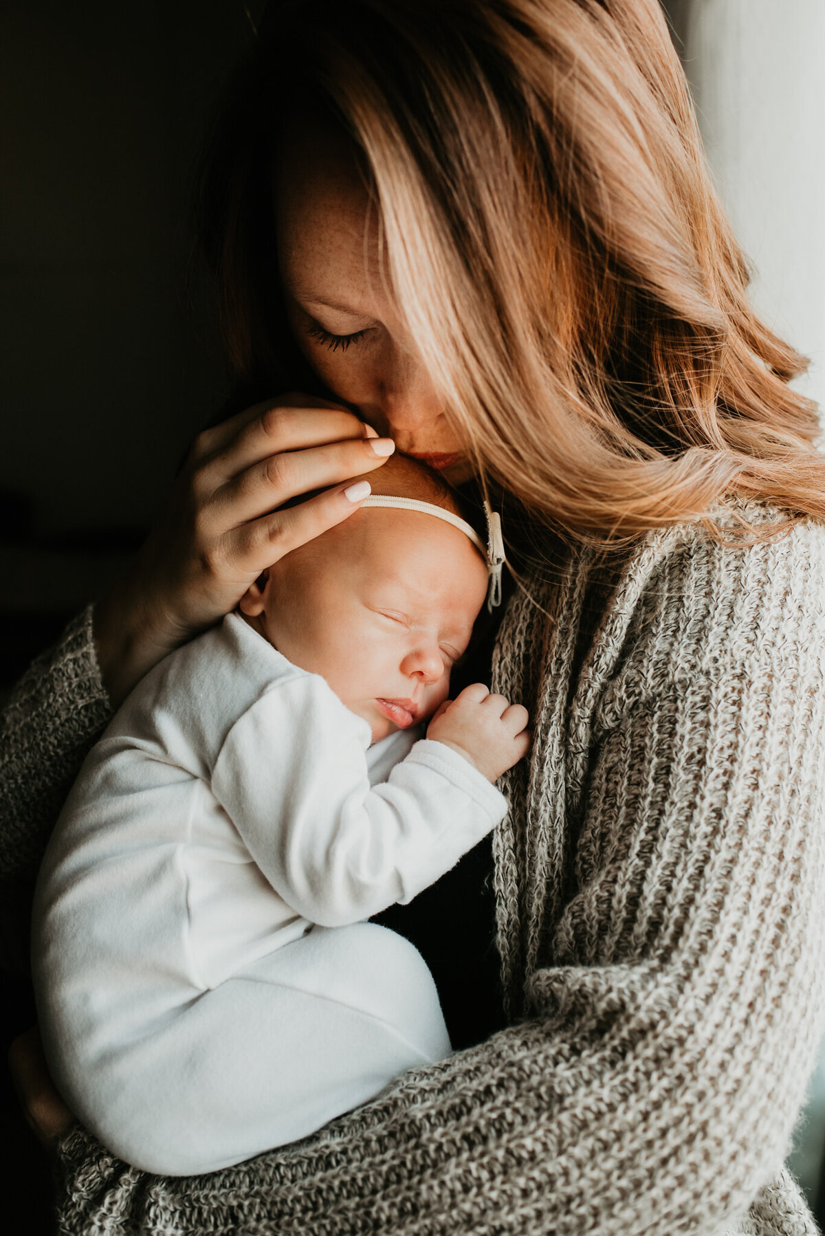 newborn in moms arms