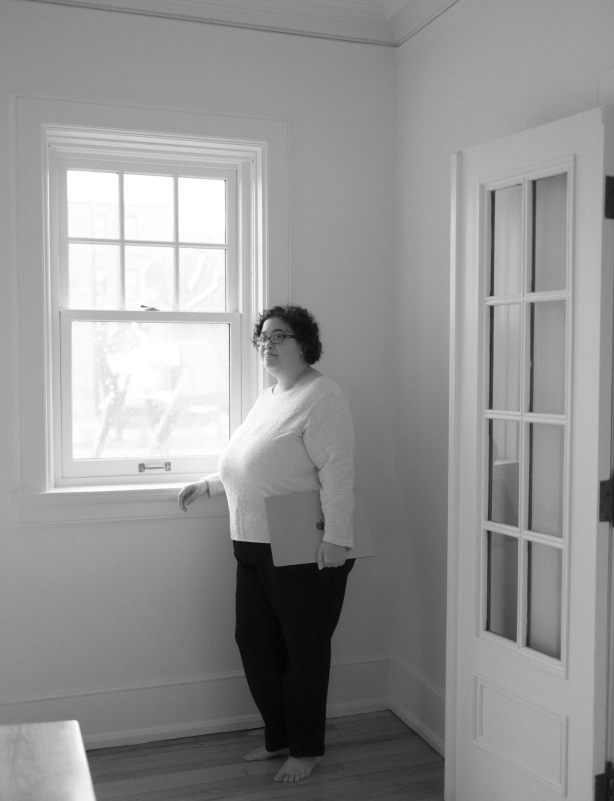 December Oak branding photoshoot at ALEO Detroit, woman in white sweater, web designer