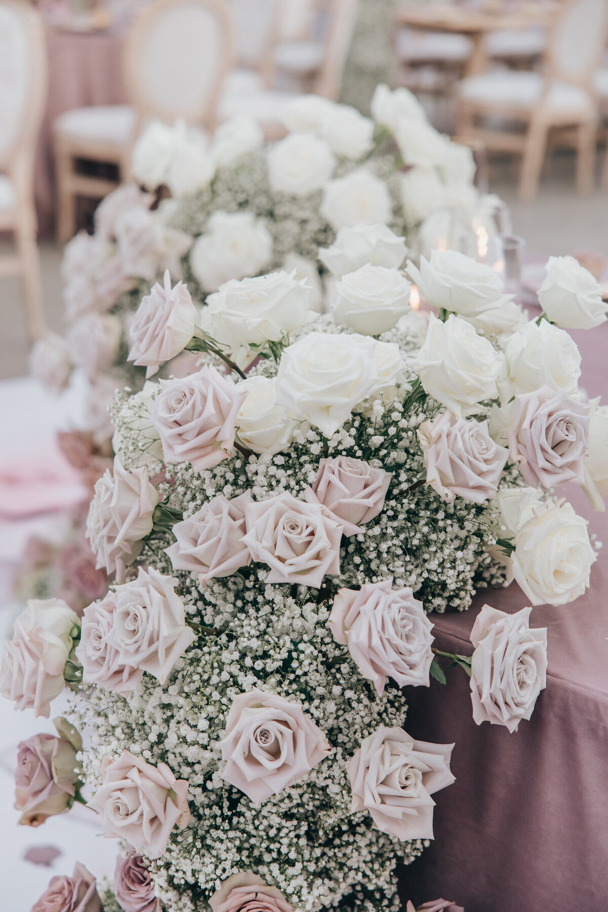 Glamorous blush and white roses wedding table florals