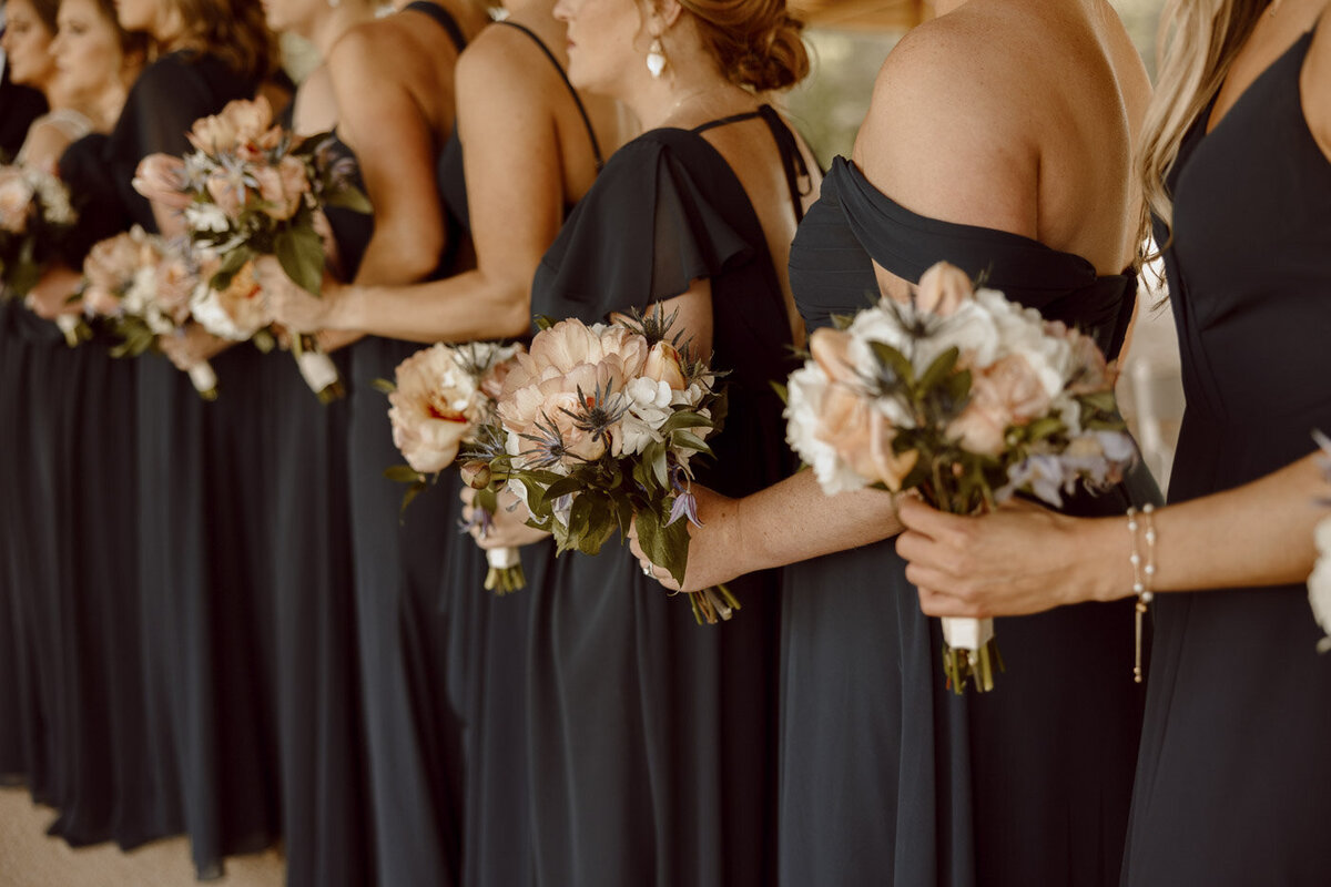 Bridesmaids Bouquets detail photo during ceremony