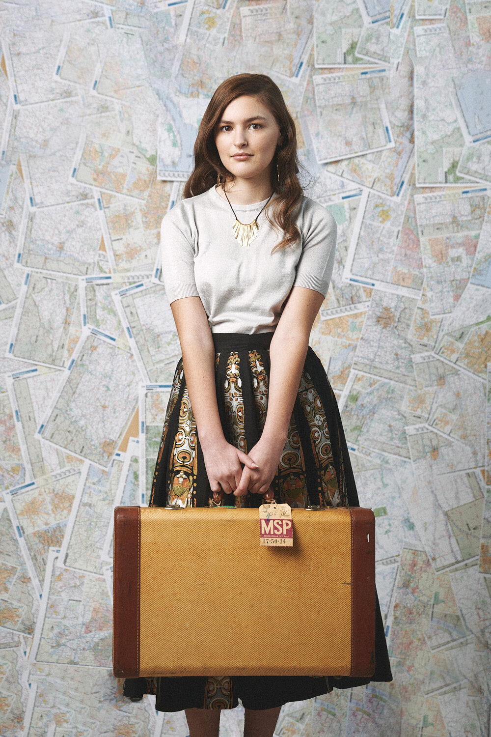 High School Senior Picture Photographer in Stylish Portrait Setting With Maps-27