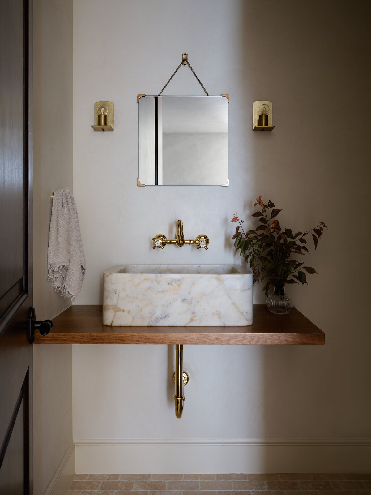 house-franc-hillside-hideaway-bathroom-remodel-renovation-jamie-sigler-home-plaster-walls-marble-vessel-sink-oak-countertop-wall-mounted-faucet-burgundy-florals-nickey-kehoe-sconce-moody-interiors-austin-texas