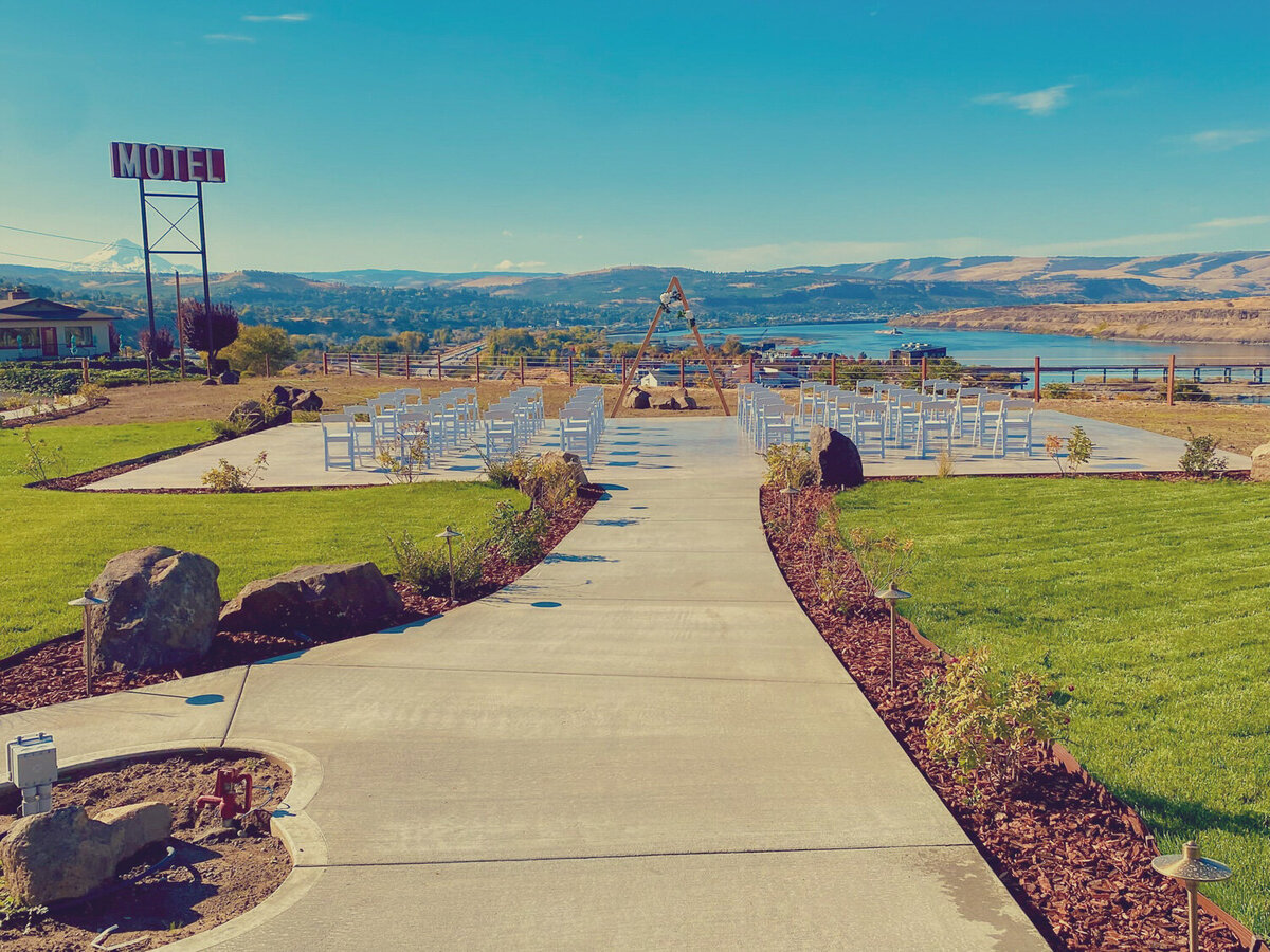 Ceremony site at Celilo Inn with arranged tables