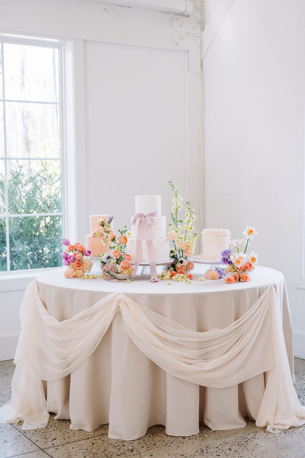 multi wedding cake setup at carolina grove