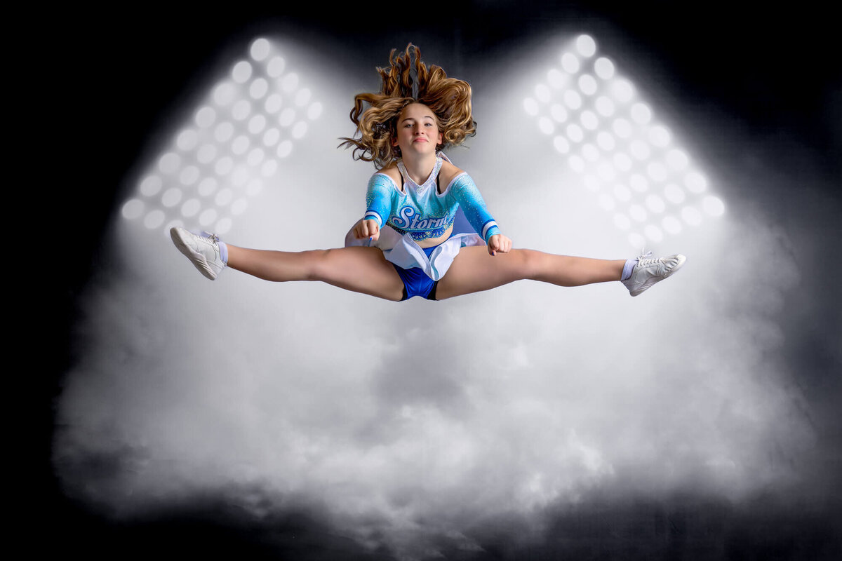 Prescott kids photographer captures Storm Elite cheerleader jumping in air