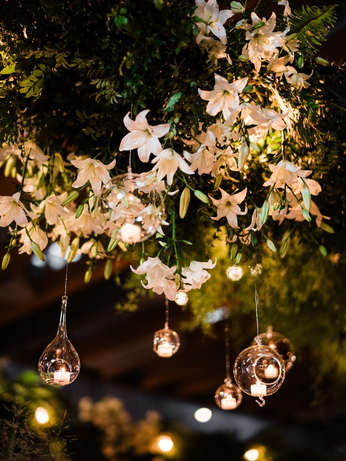 Dramatic-Ceiling-Greenery-Candle-Light-Wedding-Flora-Nova-Design-Seattle-00059