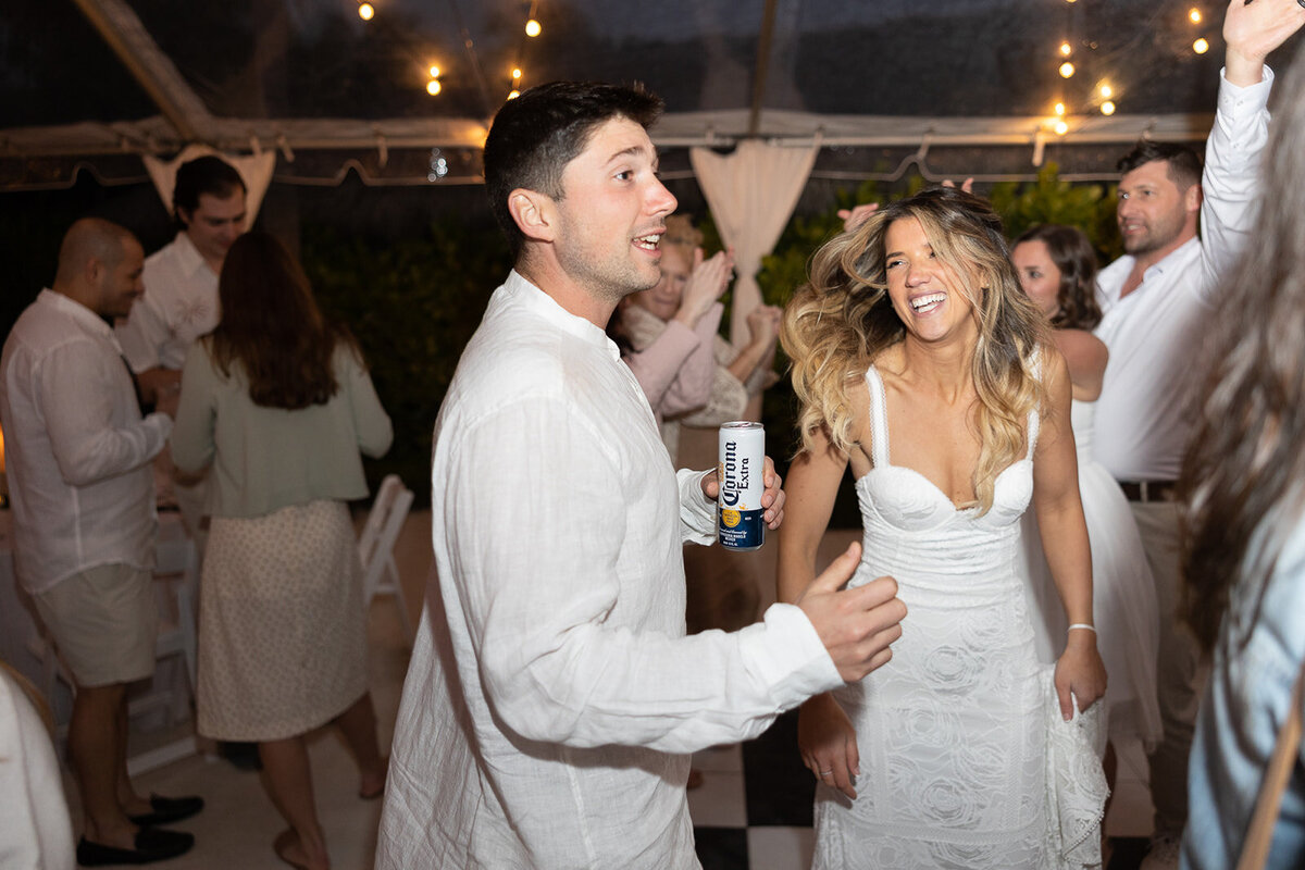 Laura and Abraham dancing and celebrating at their lively wedding reception at Cheeca Lodge Resort.